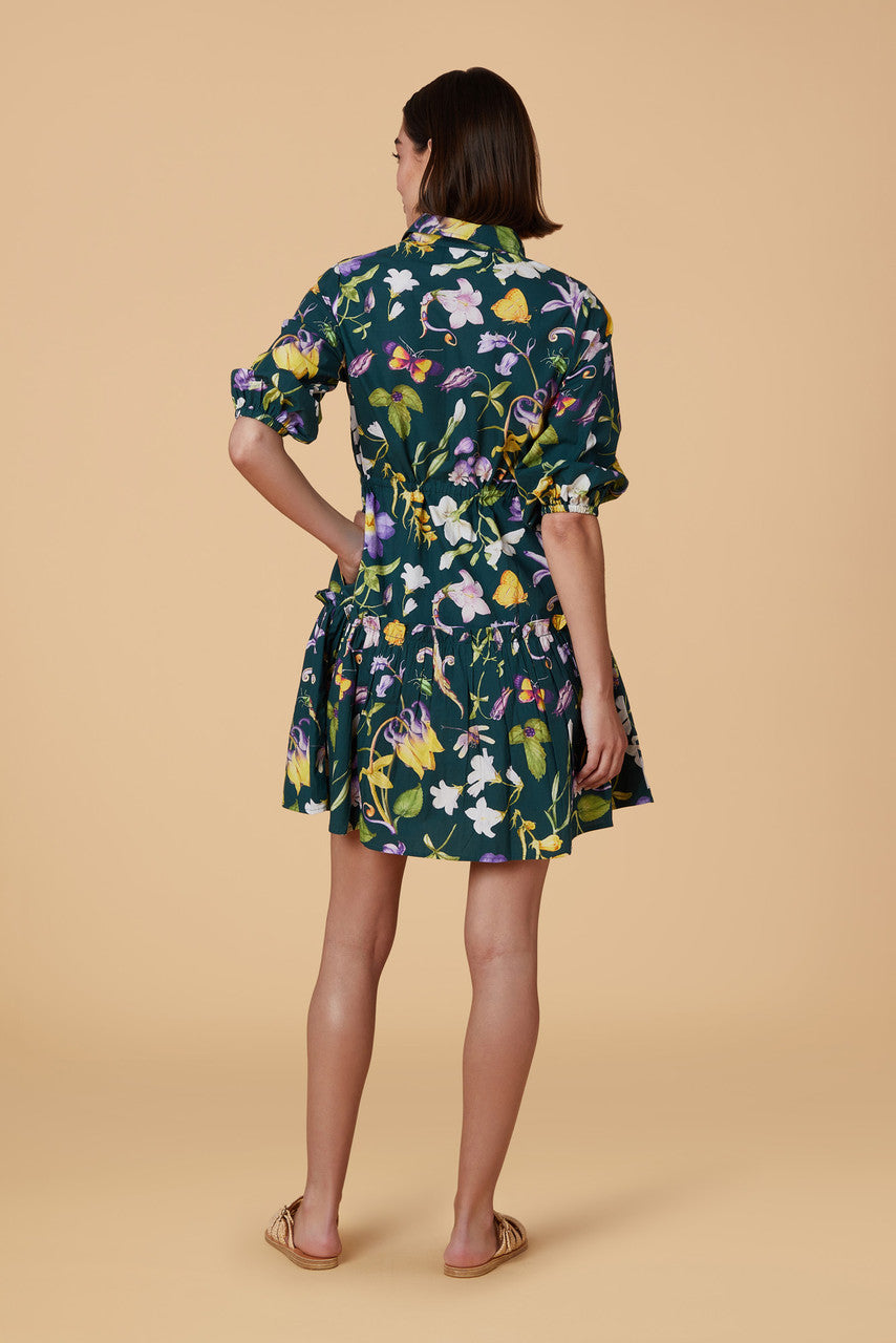 navy dress with bright and large colored florals