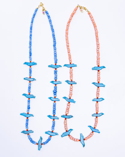 Long turquoise bird
