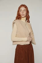 Amente reversible fur vest