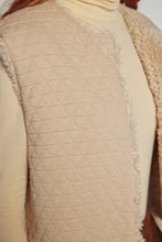 Amente reversible fur vest