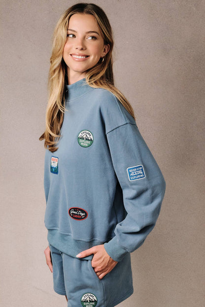 HIGH NECK LONG SLEEVE "CAMPING PATCHED" SWEATSHIRT